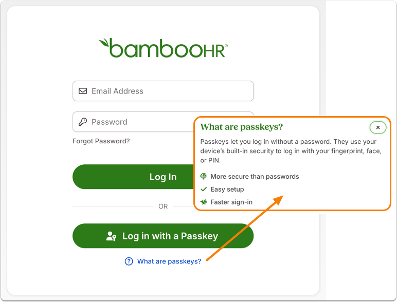 Screenshot of the BambooHR login page with fields for Email Address and Password and a green Log In button. Below, a second green button labeled Log in with a Passkey is visible. A tooltip titled “What are passkeys?” appears with text explaining: “Passkeys let you log in without a password. They use your device’s built-in security to log in with your fingerprint, face, or PIN.” A bullet list highlights More secure than passwords, Easy setup, and Faster sign-in. An orange arrow points to the tooltip.